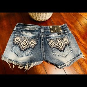 Denim shorts with white stitch embroidery